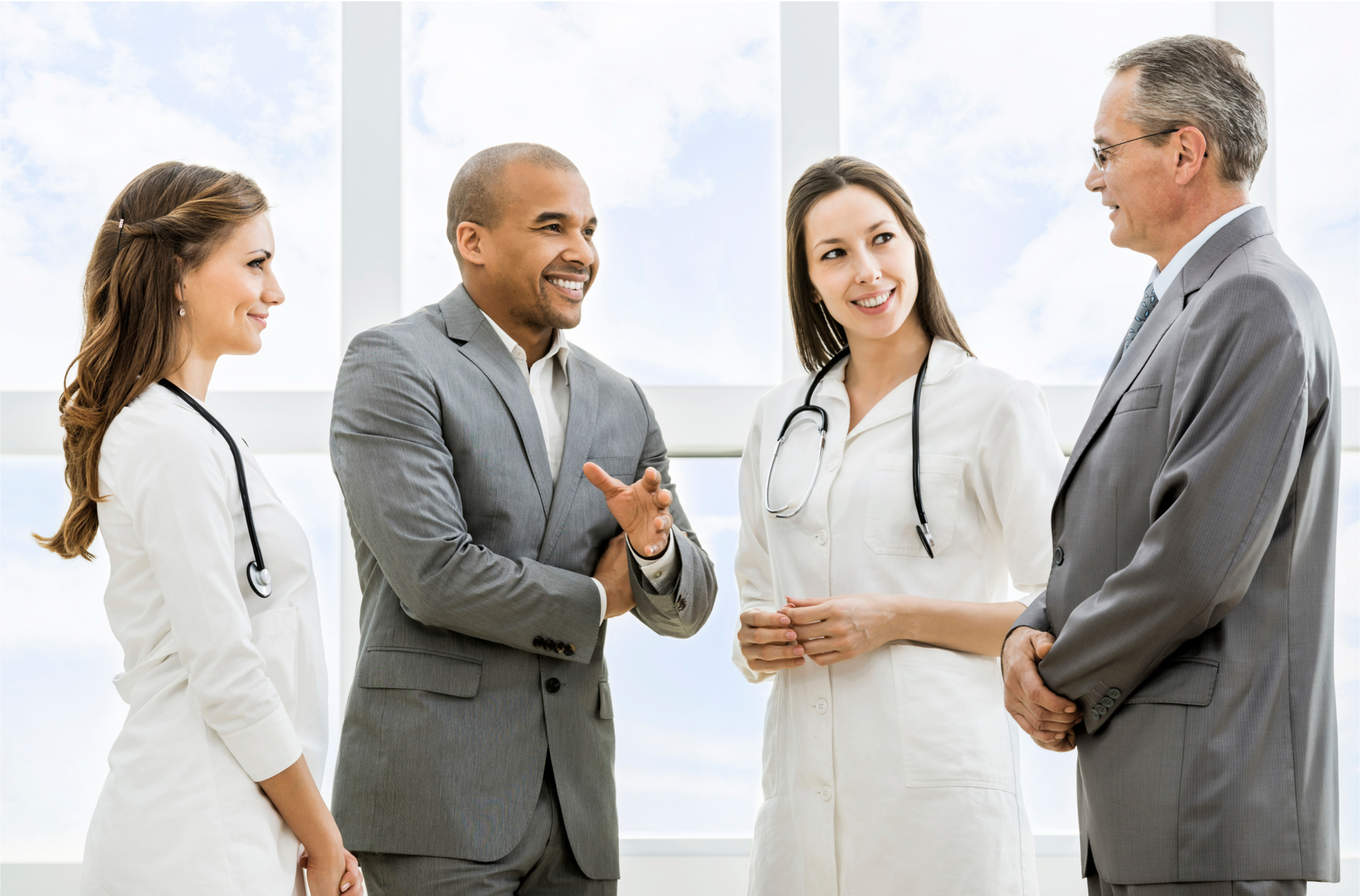 Doctors and administrators casually talking